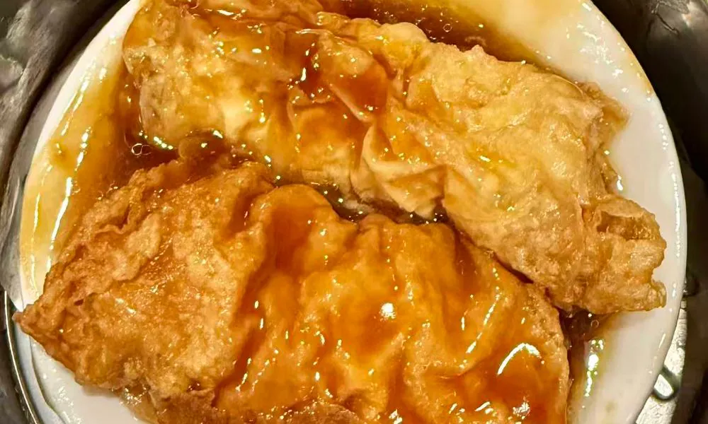 Deep-fried bean curd skin braised in savory soy sauce at Hot Wok Cafe, a Chinese Restaurant in Greens West Windsor Township