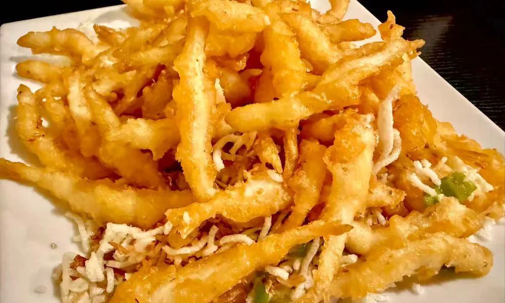 Golden crispy fried silver fish with a crunchy texture at Hot Wok Cafe, a Chinese Restaurant in Greens West Windsor Township