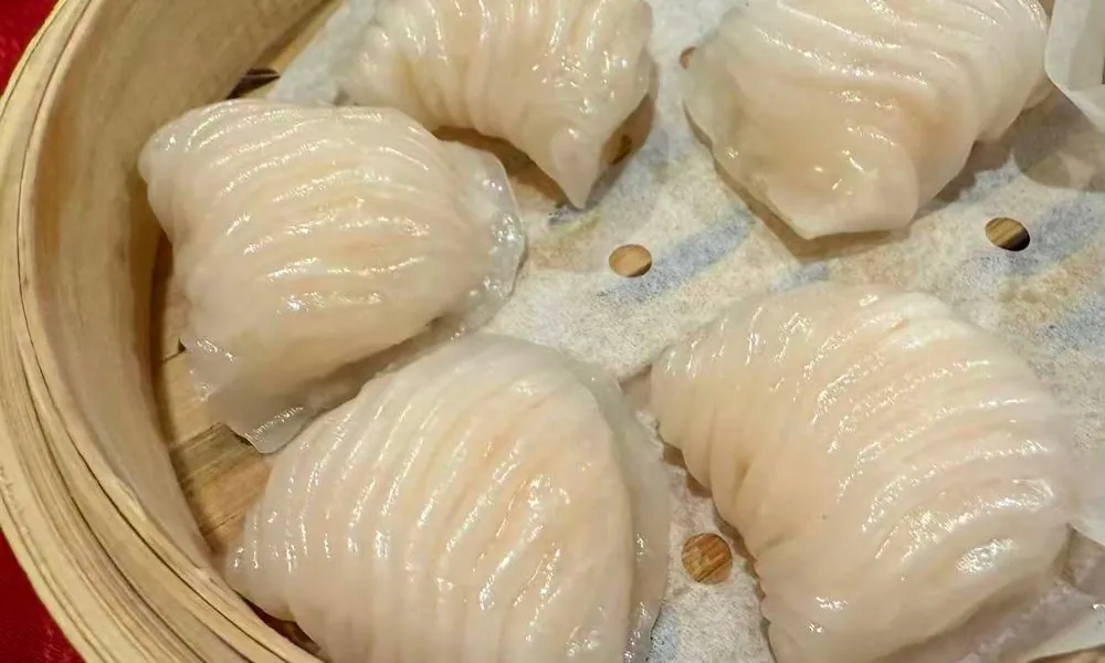 Translucent dumplings filled with fresh shrimp, steamed to perfection at Hot Wok Cafe, a Chinese Restaurant in Greens West Windsor Township
