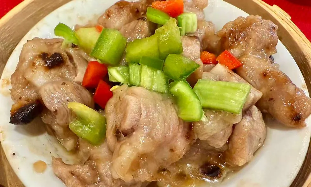 Tender steamed spare ribs with savory fermented black beans and colorful peppers at Hot Wok Cafe, a Chinese Restaurant in Greens West Windsor Township